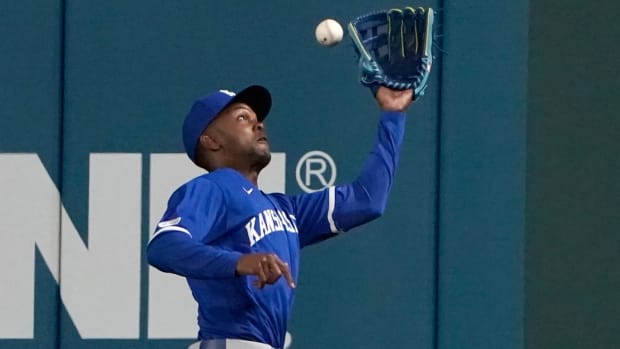 Royals outfielder Michael A. Taylor catches a ball.